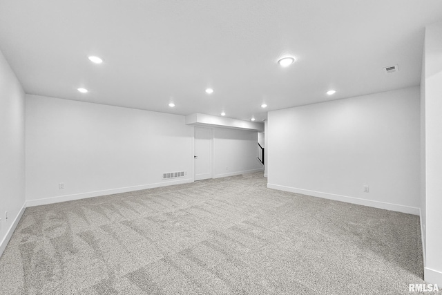 1354 Heights Ct, Bettendorf, IA 52722 - finished basement featuring recessed lighting and light carpet