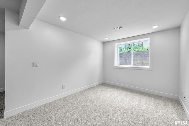 1354 Heights Ct, Bettendorf, IA 52722 - unfurnished room featuring carpet and recessed lighting