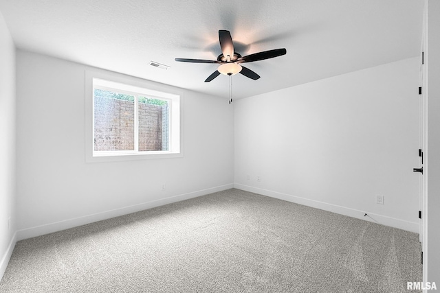 1354 Heights Ct, Bettendorf, IA 52722 - unfurnished room with ceiling fan and carpet
