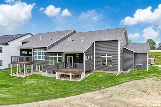 1354 Heights Ct, Bettendorf, IA 52722 - rear view of house with a shingled roof, a wooden deck, and a lawn