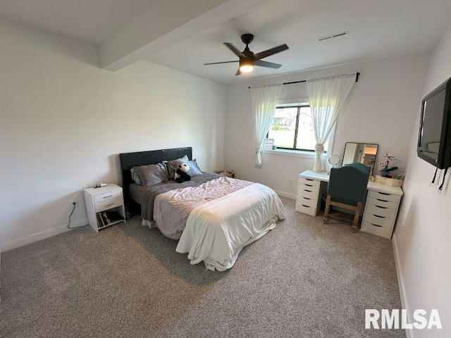 1722 17th St, De Witt, IA 52742 - carpeted bedroom featuring a ceiling fan and beam ceiling