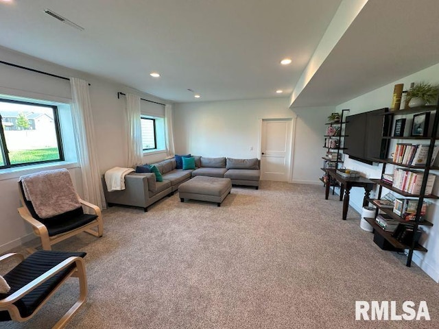1722 17th St, De Witt, IA 52742 - carpeted living room featuring recessed lighting