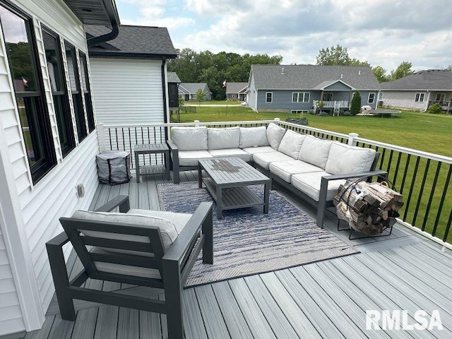 1722 17th St, De Witt, IA 52742 - wooden terrace with an outdoor living space, a lawn, and a residential view