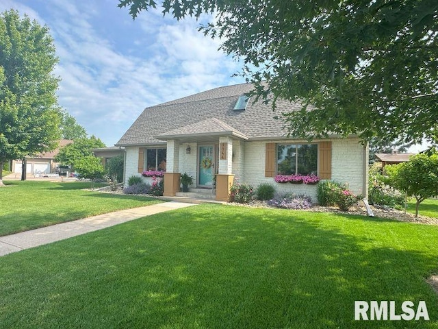 1144 Brookview Dr, De Witt, IA 52742 - view of front of property with a front lawn, a shingled roof, stone siding, and brick siding