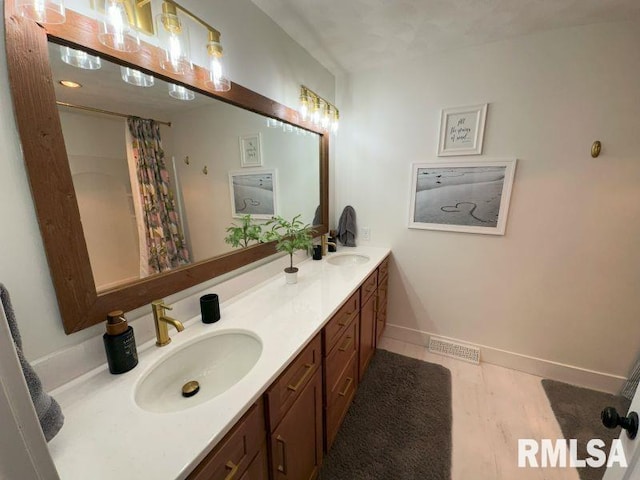 1144 Brookview Dr, De Witt, IA 52742 - full bath featuring double vanity and a shower with shower curtain