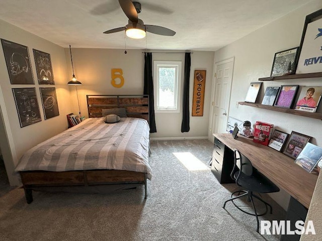 1144 Brookview Dr, De Witt, IA 52742 - bedroom featuring carpet flooring, ceiling fan, and a desk
