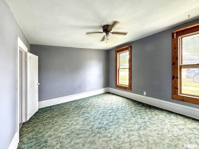 511 Fulton St, Grand Mound, IA 52751 - carpeted empty room with a ceiling fan and baseboards