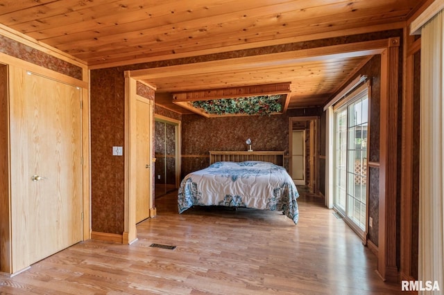 1445 Lawrence Ave, Camanche, IA 52730 - bedroom with access to exterior, wood ceiling, and light wood finished floors