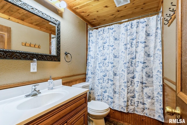 1445 Lawrence Ave, Camanche, IA 52730 - full bathroom with vanity, a textured wall, wooden ceiling, and shower / bath combo