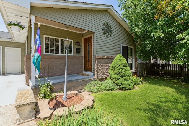1445 Lawrence Ave, Camanche, IA 52730 - property entrance with brick siding