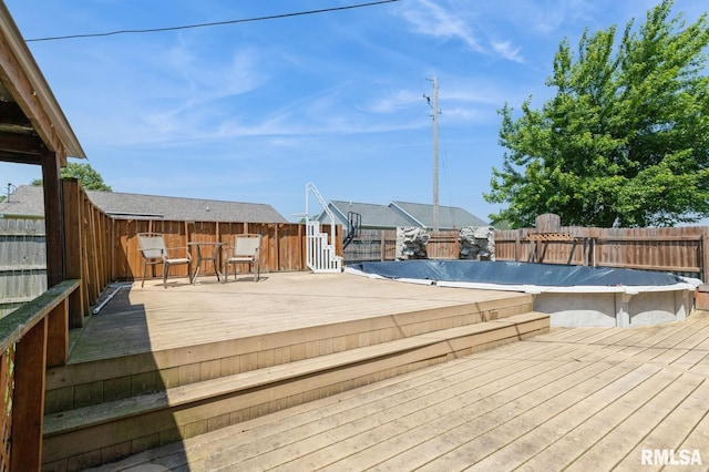 1445 Lawrence Ave, Camanche, IA 52730 - deck featuring a fenced backyard
