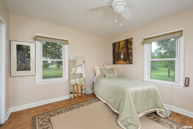 13524 US Route 67, Milan, IL 61264 - bedroom featuring wood finished floors and a ceiling fan