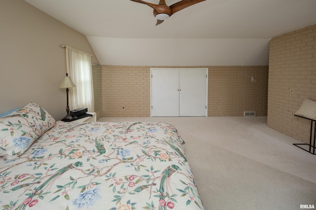 13524 US Route 67, Milan, IL 61264 - bedroom featuring brick wall, lofted ceiling, light carpet, and a ceiling fan