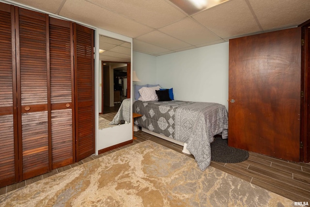 13524 US Route 67, Milan, IL 61264 - bedroom with a paneled ceiling, wood finish floors, and a closet