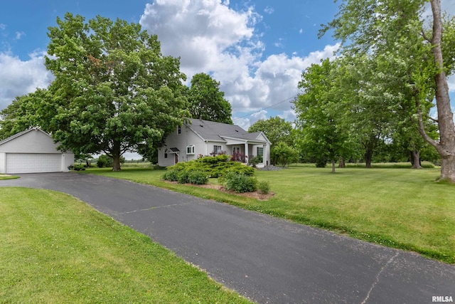 13524 US Route 67, Milan, IL 61264 - view of front facade featuring an outdoor structure, a front lawn, and a garage