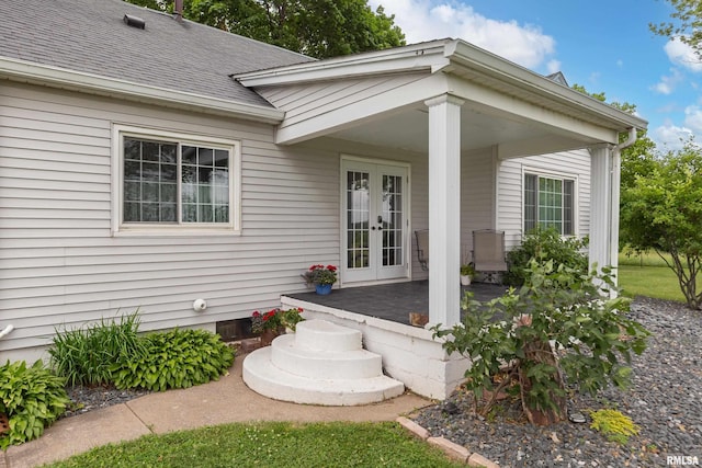 13524 US Route 67, Milan, IL 61264 - view of exterior entry featuring french doors and roof with shingles