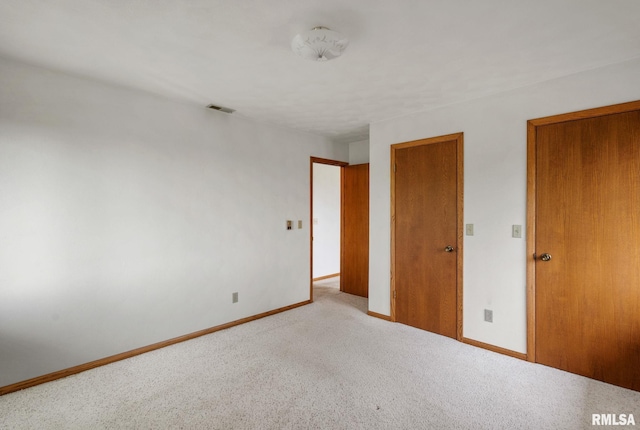 20425 20th Ave, Stockton, IA 52769 - unfurnished bedroom with carpet floors and a closet
