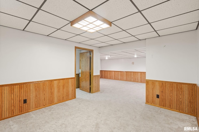 20425 20th Ave, Stockton, IA 52769 - finished basement with wainscoting, a drop ceiling, wooden walls, and carpet floors