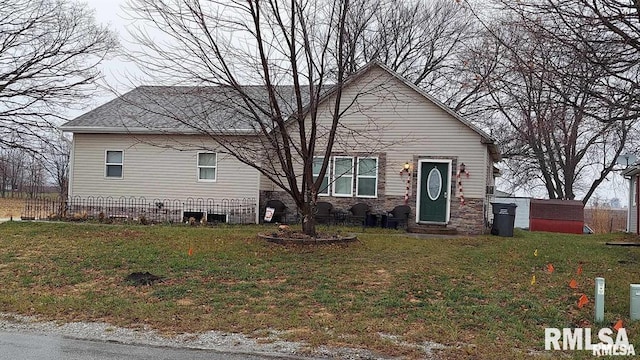 701 3rd St, Seaton, IL 61476 - bungalow-style house featuring entry steps and stone siding