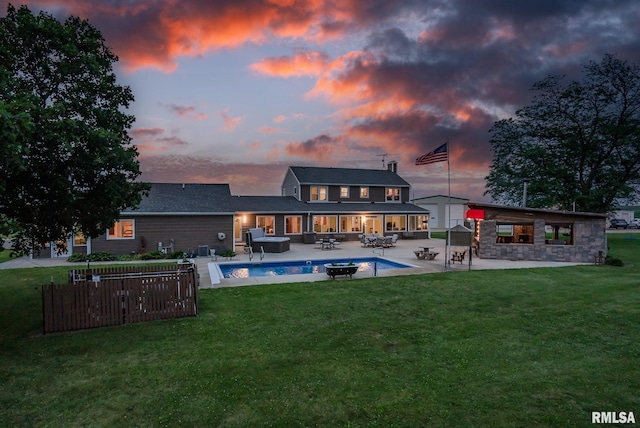 3473 270th St, De Witt, IA 52742 - back of house featuring an outdoor pool, outdoor dining space, a patio, and an outdoor hangout area