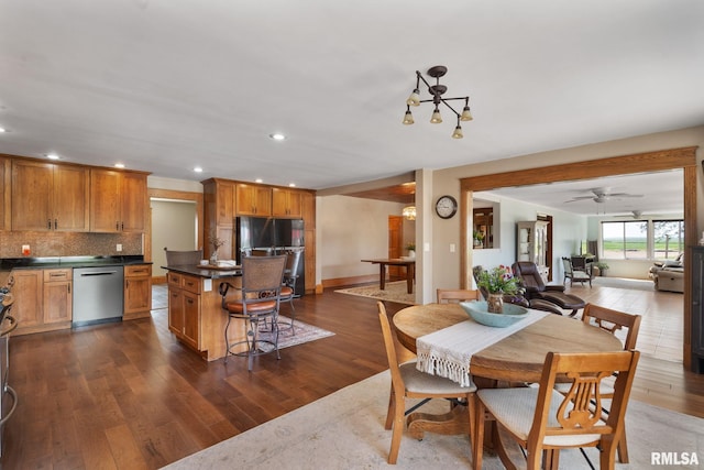 3473 270th St, De Witt, IA 52742 - dining room with recessed lighting, dark wood-type flooring, and a ceiling fan