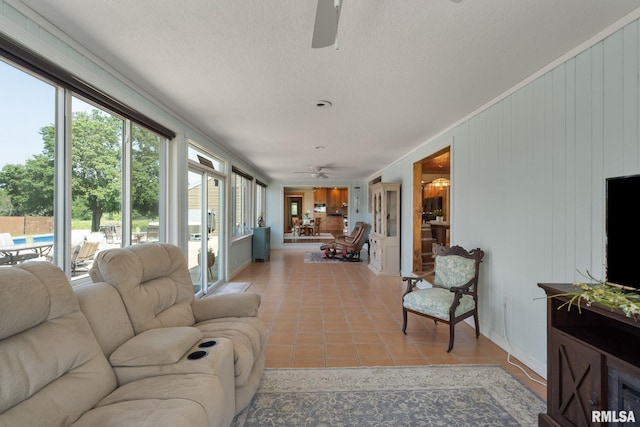 3473 270th St, De Witt, IA 52742 - sunroom / solarium with tile patterned floors and a textured ceiling