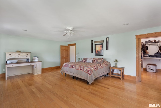 3473 270th St, De Witt, IA 52742 - bedroom featuring light wood-type flooring and a ceiling fan