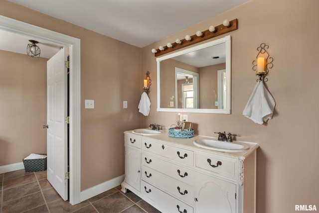 3473 270th St, De Witt, IA 52742 - full bathroom featuring double vanity and baseboards