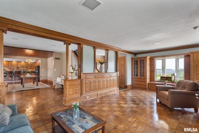 3473 270th St, De Witt, IA 52742 - living room with crown molding and a chandelier