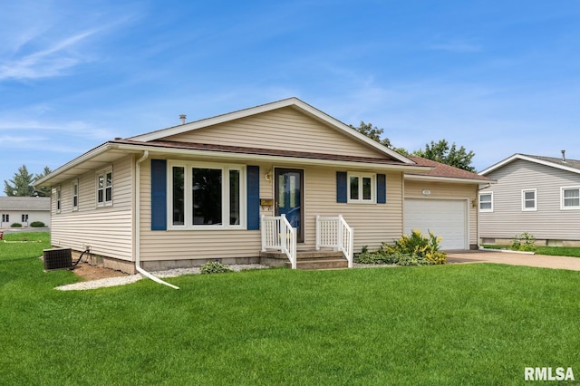 1031 15th Pl, Camanche, IA 52730 - single story home with an attached garage, concrete driveway, and a front lawn