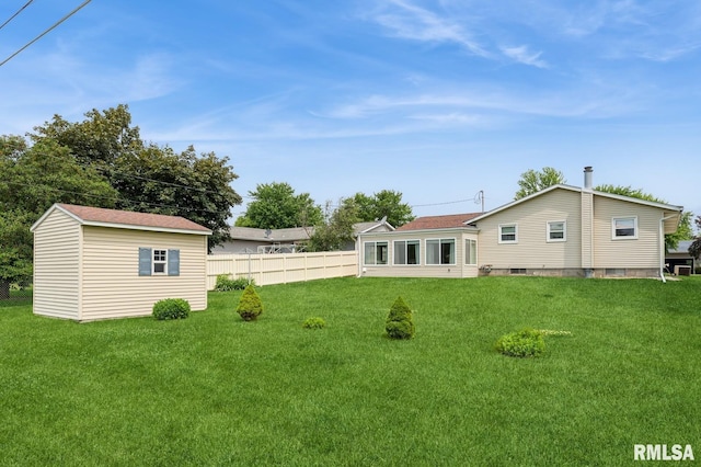 1031 15th Pl, Camanche, IA 52730 - view of yard featuring an outdoor structure