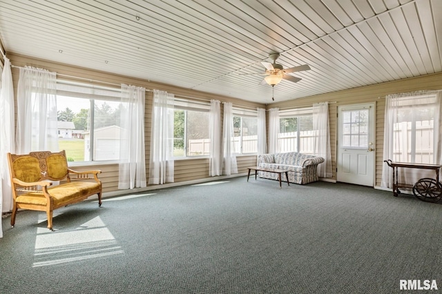 1031 15th Pl, Camanche, IA 52730 - sunroom featuring healthy amount of natural light, carpet floors, and ceiling fan