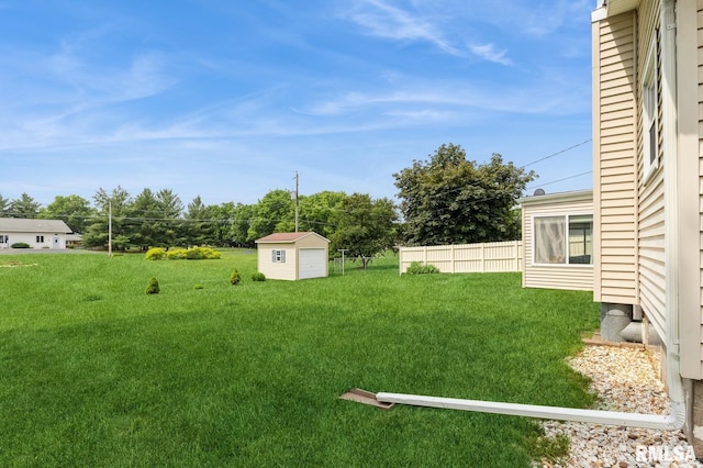 1031 15th Pl, Camanche, IA 52730 - view of yard with a storage shed