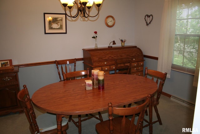4145 Aspen Hills Dr, Bettendorf, IA 52722 - dining room featuring a baseboard heating unit and a chandelier