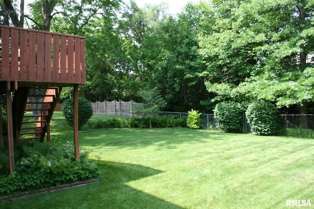 4145 Aspen Hills Dr, Bettendorf, IA 52722 - fenced backyard with stairway and a deck