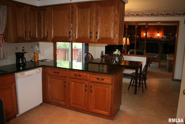 4145 Aspen Hills Dr, Bettendorf, IA 52722 - kitchen featuring dishwasher, brown cabinetry, and a peninsula