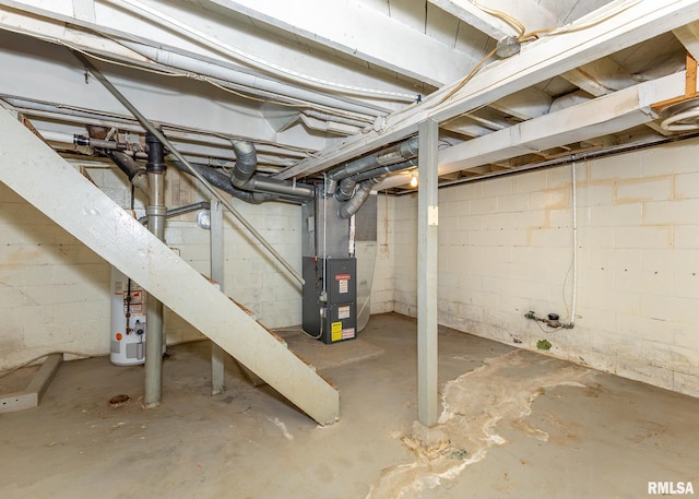 430 10th Pl, Camanche, IA 52730 - unfinished below grade area featuring heating unit and concrete block wall