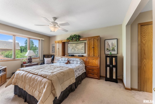 5903 36th Avenue Ct Unit 19, Moline, IL 61265 - bedroom featuring light colored carpet and a ceiling fan