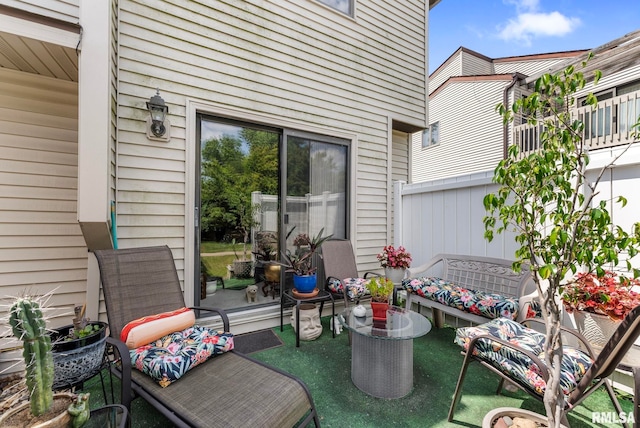 5903 36th Avenue Ct Unit 19, Moline, IL 61265 - view of patio / terrace featuring an outdoor hangout area