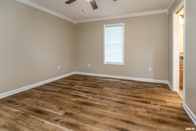 1321 N 7th St, Herrin, IL 62948 - unfurnished room featuring ornamental molding, ceiling fan, and wood finished floors