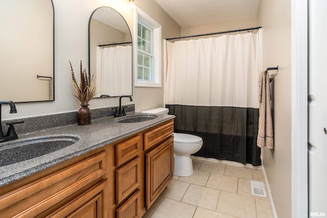 1321 N 7th St, Herrin, IL 62948 - full bath with double vanity, tile patterned floors, and a shower with curtain