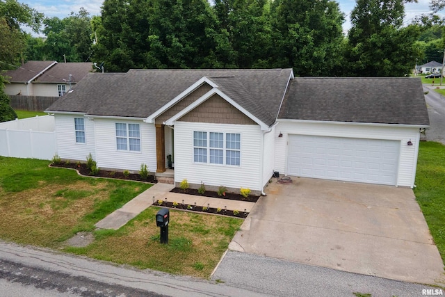 1321 N 7th St, Herrin, IL 62948 - view of front of property with an attached garage, driveway, and roof with shingles