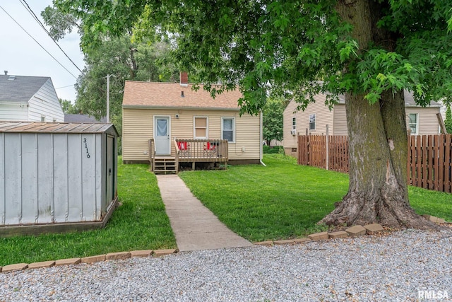 3116 Orchard Ave, Davenport, IA 52802 - back of house featuring a shed and a wooden deck