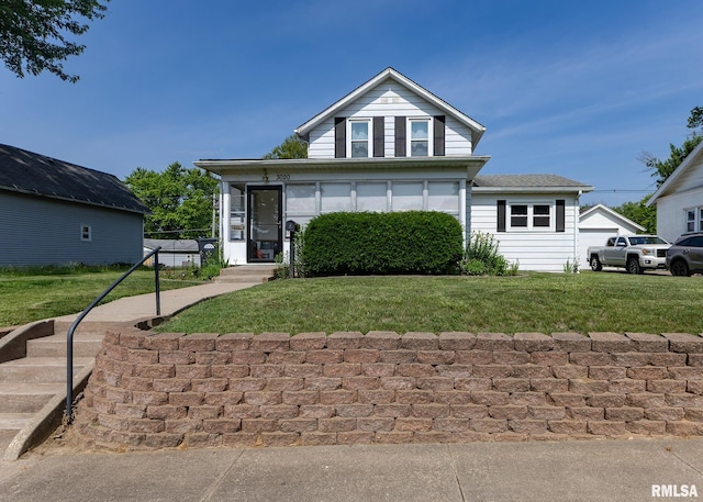 3020 Cleveland St, Clinton, IA 52732 - view of front of house featuring a front lawn