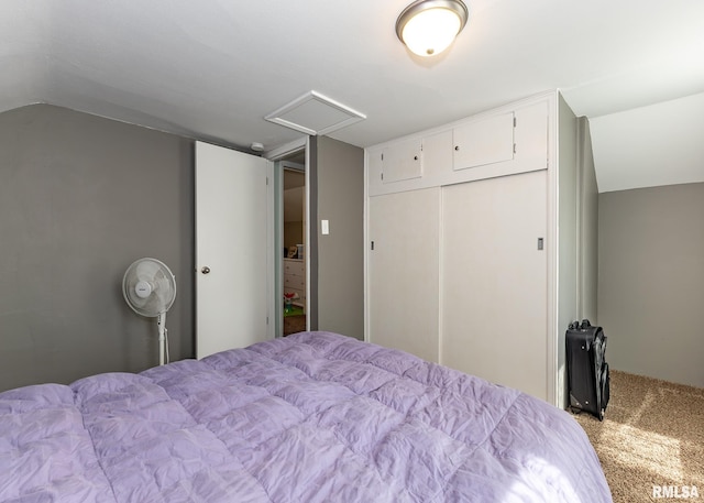 3020 Cleveland St, Clinton, IA 52732 - bedroom featuring lofted ceiling, carpet, and a closet