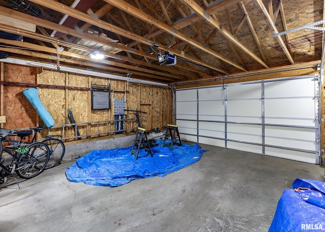 3020 Cleveland St, Clinton, IA 52732 - garage featuring a garage door opener