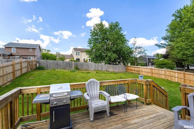 1426 W 48th St, Davenport, IA 52806 - wooden terrace featuring a grill and a fenced backyard