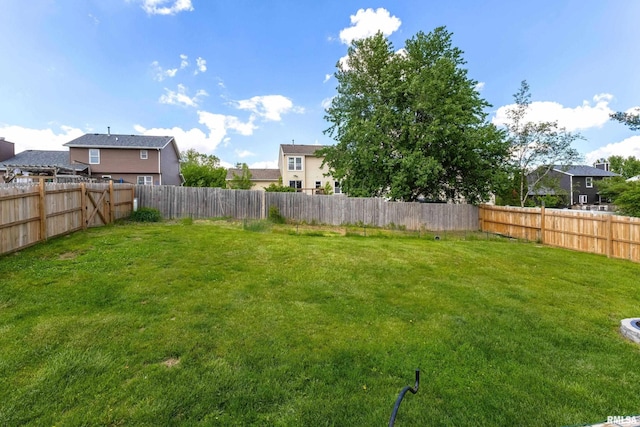 1426 W 48th St, Davenport, IA 52806 - fenced backyard featuring a residential view