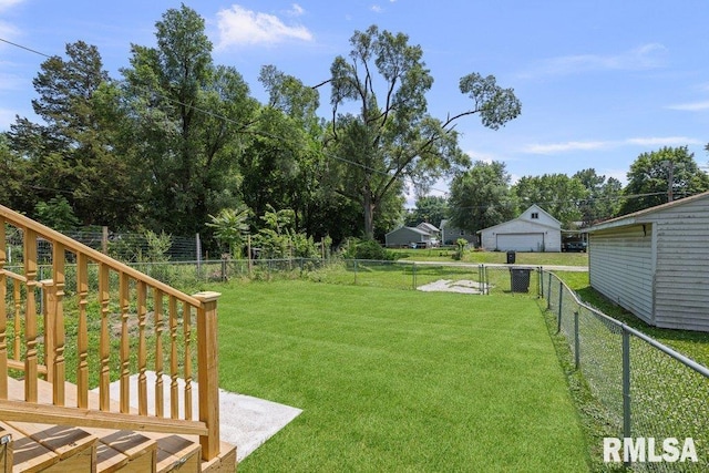 516 19th Ave, Rock Island, IL 61201 - fenced backyard featuring a garage