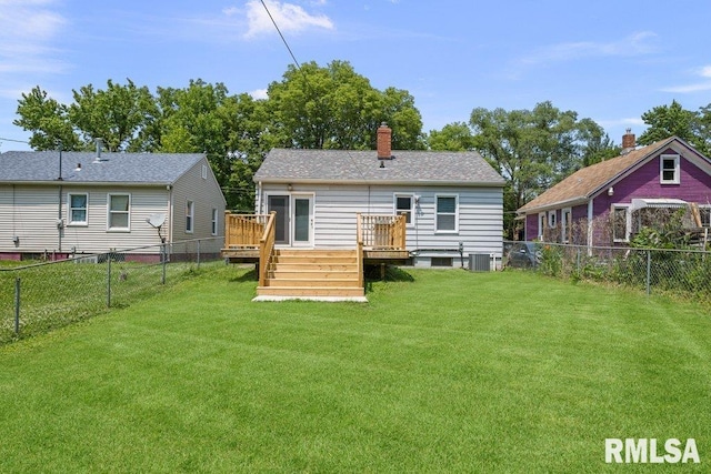 516 19th Ave, Rock Island, IL 61201 - rear view of property featuring a fenced backyard, a deck, and a chimney